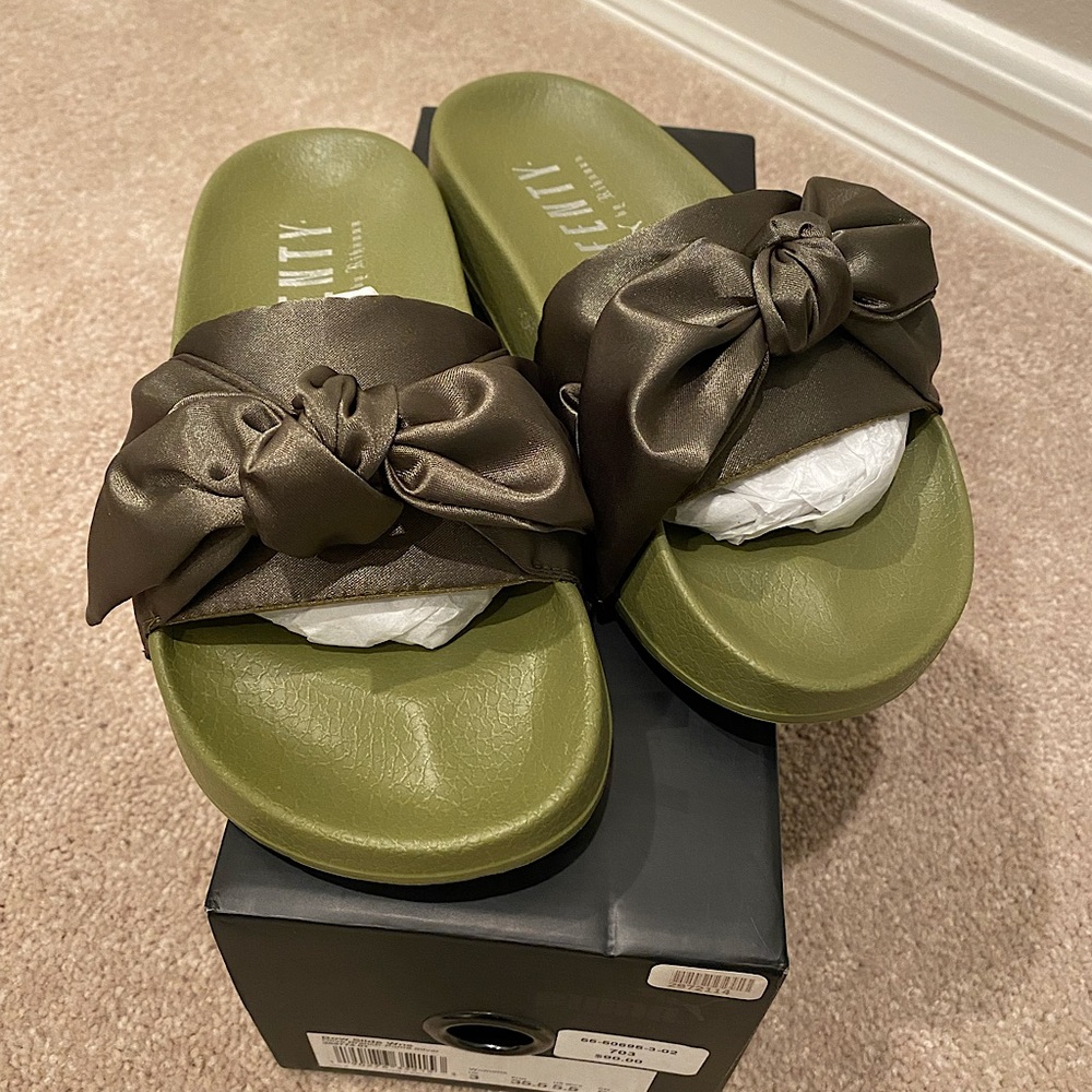 Rihanna Fenty x Puma bow slides in olive